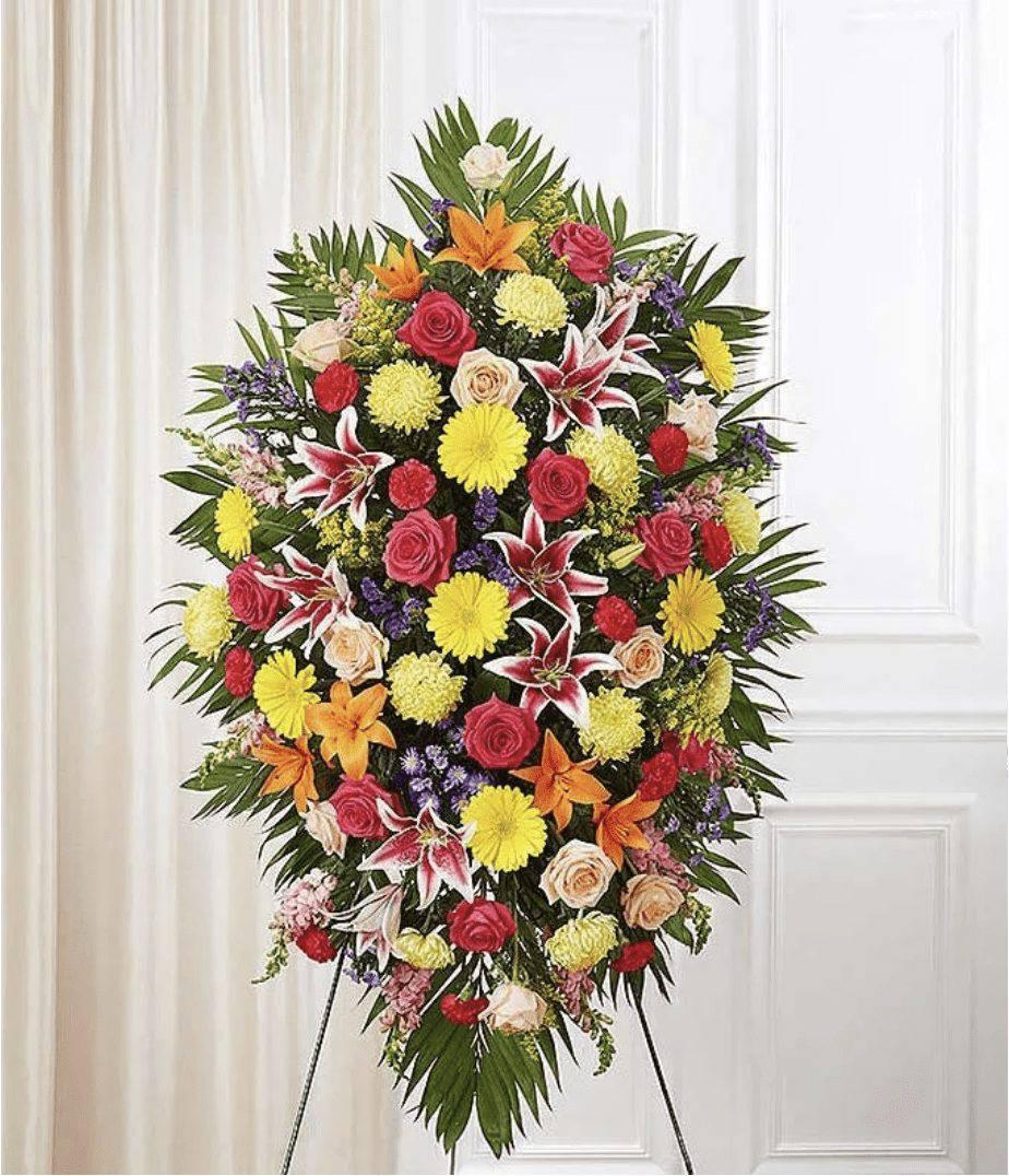 Multicolor Bright Sympathy Standing Spray - DGM Flowers  | Fort Lauderdale Florist